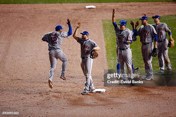 Daniel Murphy and Juan Lagares of the New York Mets celebrate after defeating the Chicago Cubs in game three of the 2015 MLB National League...