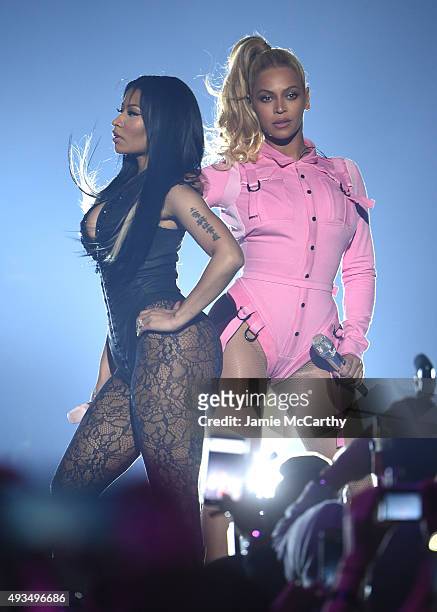 Nicki Minaj and Beyonce perform onstage during TIDAL X: 1020 Amplified by HTC at Barclays Center of Brooklyn on October 20, 2015 in New York City.