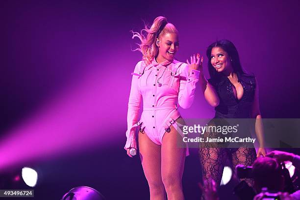 Beyonce and Nicki Minaj perform onstage during TIDAL X: 1020 Amplified by HTC at Barclays Center of Brooklyn on October 20, 2015 in New York City.