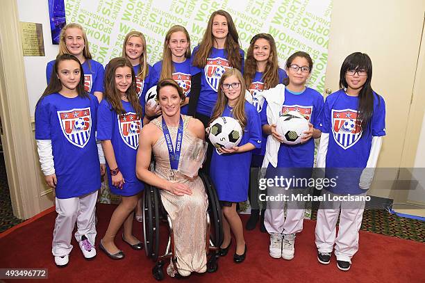 Tatyana McFadden poses with the Wilma Rudolph Courage Award backstage during the 36th Annual Salute to Women In Sports at Cipriani Wall Street on...