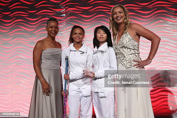 Tennis players Katrina Adams and Coco Vandeweghe pose onstage during the 36th Annual Salute to Women In Sports at Cipriani Wall Street on October 20,...