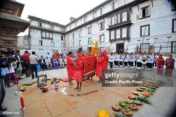 Isipili Ritual Nepalese priest performs traditional rituals over the Fulpati, which ...