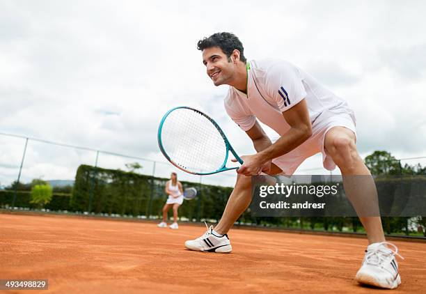 man playing tennis - serving sport stockfoto's en -beelden