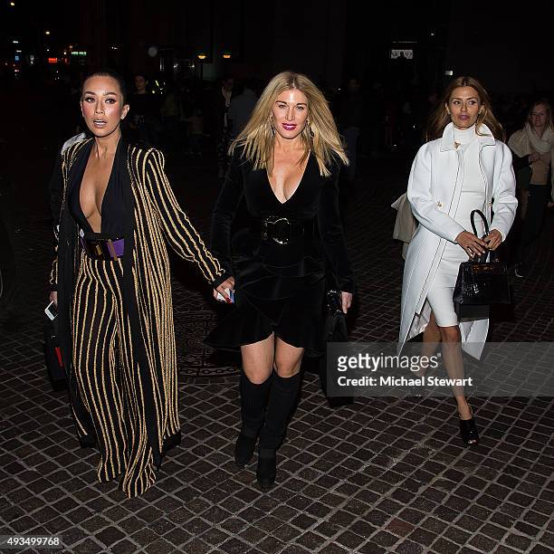Princess Ezurin Khyra, Hofit Golan and Victoria Bonya are seen outside of the BALMAIN X H&M Collection launch event at 23 Wall Street on October 20,...