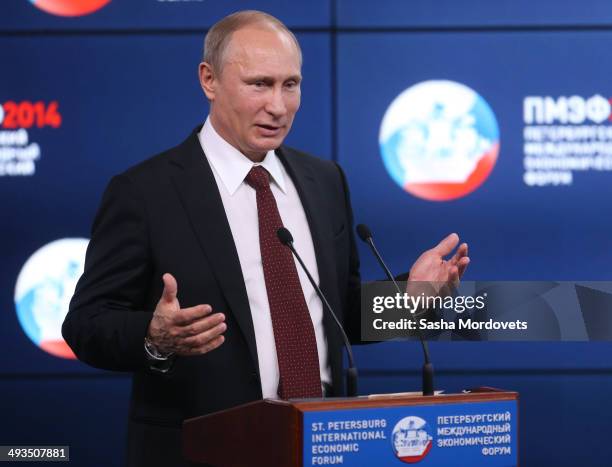 Russian President Vladimir Putin speaks during a conference at the Saint Petersburg International Economic Forum .