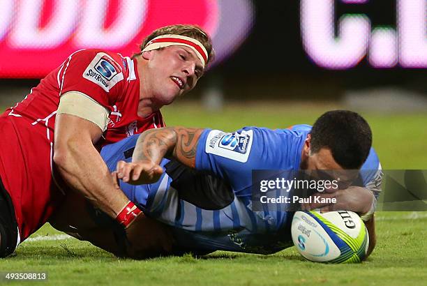 Chris Tuatara-Morrison of the Force dives across the try line during the round 15 Super Rugby match between the Western Force and the Lions at nib...