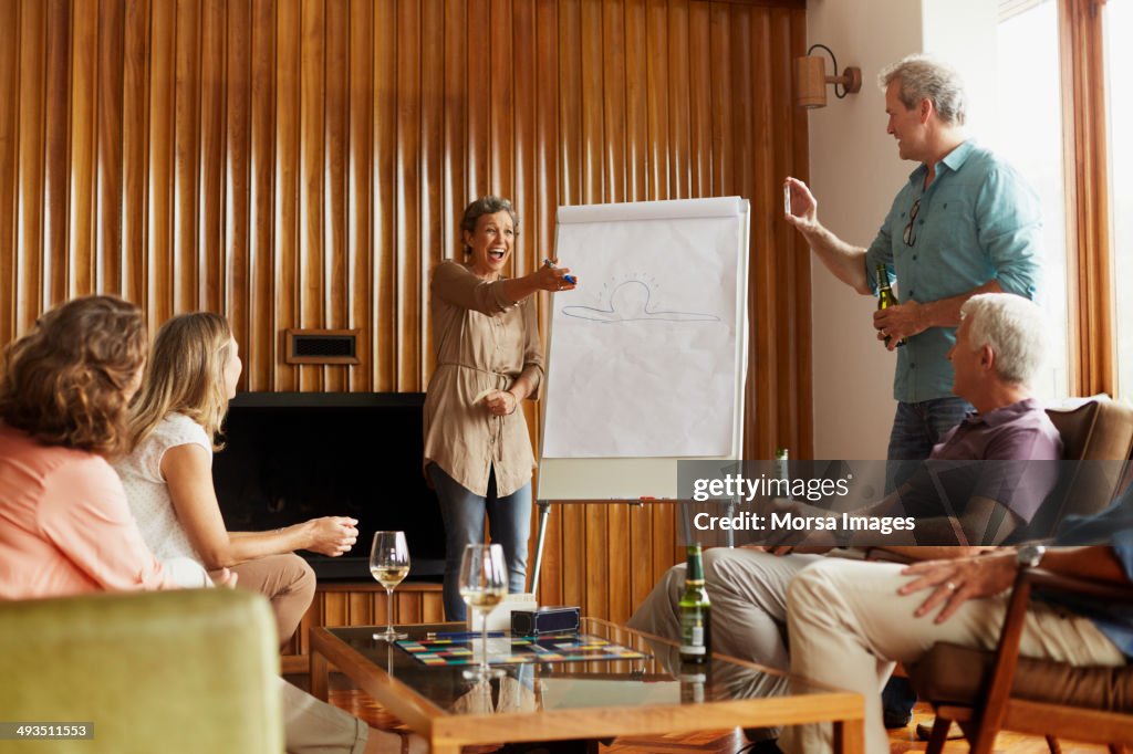 Cheerful friends enjoying indoor games