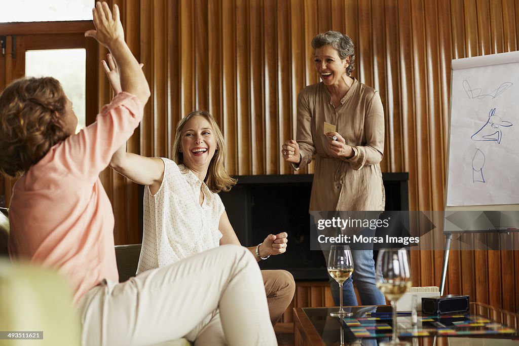 Women enjoying indoor games