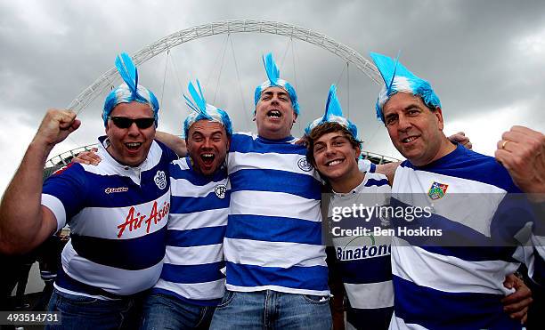 Fans make their way to the stadum prior to the Sky Bet Championship Playoff Final match between Derby County and Queens Park Rangers at Wembley...