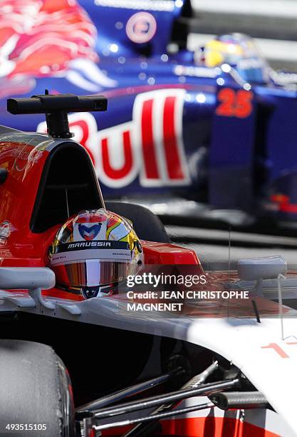 Marussia's French driver Jules Bianchi drives at the Monaco street circuit during the third practice session of the Monaco Formula One Grand Prix in...