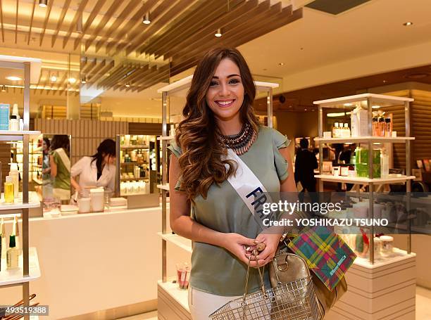 Miss International contestant, Miss France Charlotte Pirroni shops at Tokyo's Isetan department store on October 21, 2015. The Miss International...