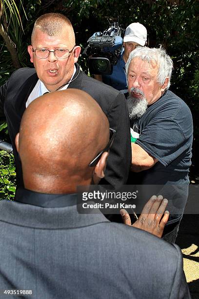 Protester Seamus Doherty is prevented access to a public access staircase by security following Dutch MP Geert Wilders press conference outside the...