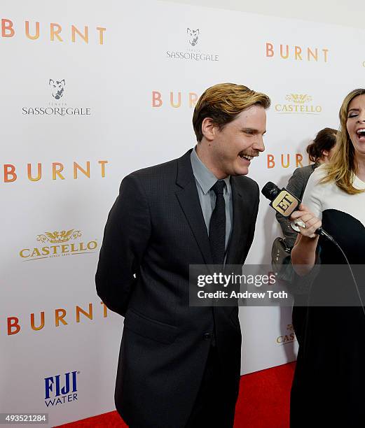 Daniel Bruhl attends the New York premiere of "BURNT", presented by The Weinstein Company, Sassoregale Wine, Castello Cheese and FIJI Water on...