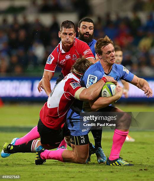 Dane Haylett-Petty of the Force gets tackled by Jaco Kriel of the Lions during the round 15 Super Rugby match between the Western Force and the Lions...