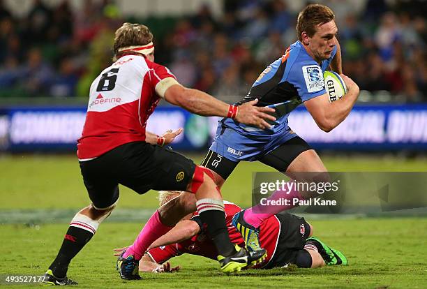 Dane Haylett-Petty of the Force looks to avoid being tackled by Jaco Kriel of the Lions during the round 15 Super Rugby match between the Western...