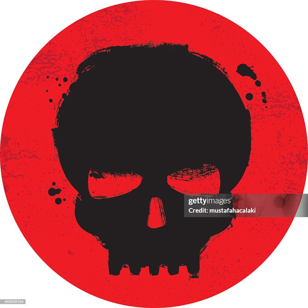 Grunge peint crâne symbole sur fond rouge