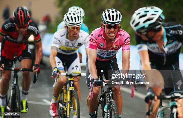 Race leader and wearer of the Maglia Rosa Rigoberto Uran of Colombia and Omega Pharma-Quickstep in action during the fourteenth stage of the 2014...