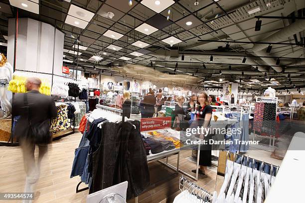 Guests walk through the aisles at the launch of the first Australian MRP store at Melbourne Central on October 21, 2015 in Melbourne, Australia.