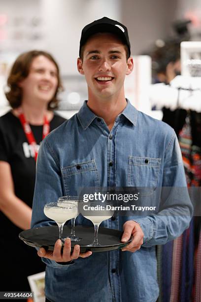 Waiter presents drinks to guests at the launch of the first Australian MRP store at Melbourne Central on October 21, 2015 in Melbourne, Australia.