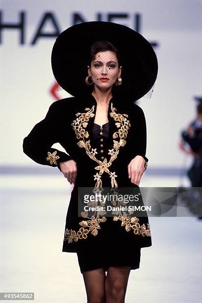 Model walks the runway during the Chanel show Haute Couture Fall/Winter 1987/1988 in Paris, France, on July 27, 1987.