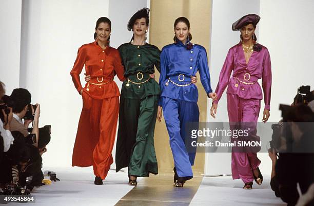 Modesl walk the runway during the Chanel show Ready-To-Wear Fall/Winter 1988/1989 in Paris, France, on March 21, 1988.