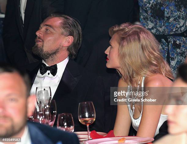 Leonardo DiCaprio and Toni Garrn attend amfAR's 21st Cinema Against AIDS Gala Presented By WORLDVIEW, BOLD FILMS, And BVLGARI at Hotel du...