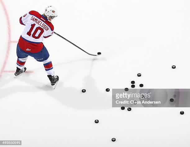 Henrik Samuelsson of the Edmonton Oil Kings fires a shot in the warm-up prior to play against the Val'Dor Foreurs in the Semi-Final of the 2014...