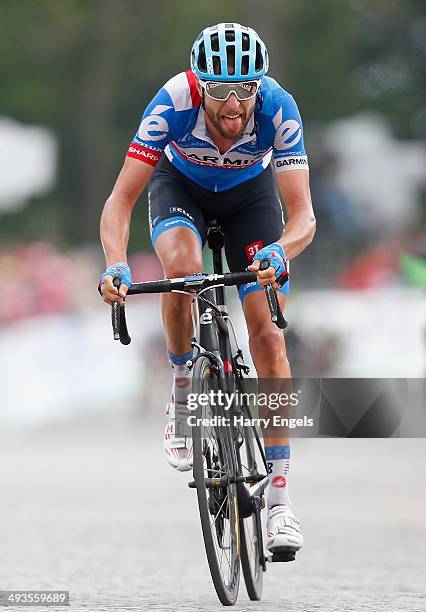 Ryder Hesjedal of Canada and team Garmin-Sharp crosses the finish line during the fourteenth stage of the 2014 Giro d'Italia, a 164km high mountain...