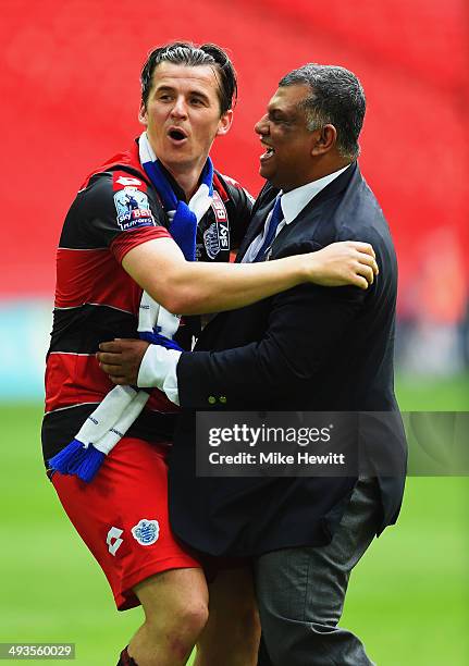 Joey Barton of Queens Park Rangers celebrates with Queens Park Rangers Chairman Tony Fernandes following their victory during the Sky Bet...