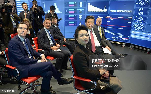 Chancellor George Osborne Madame Peng Liyuan Chinese President Xi Jinping and Prince Andrew, Duke of York listen to Professor Yike Guo during a visit...