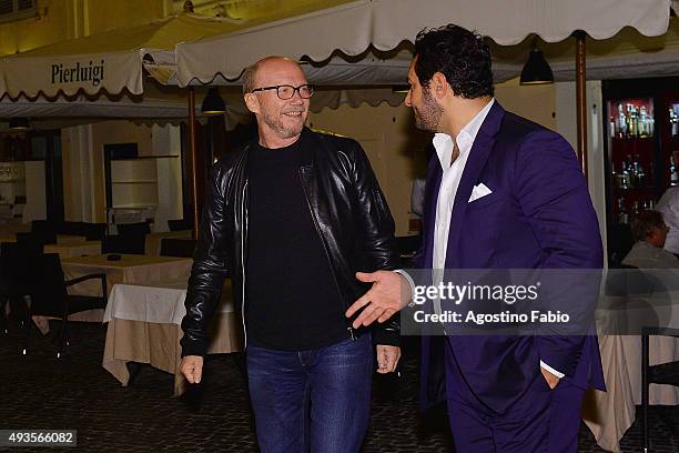 Paul Haggis is dining at Pierlugi's restaurant with Alexandra Dinu and Darina Pavlova seen during the 10th Rome Film Fest on October 20, 2015 in...