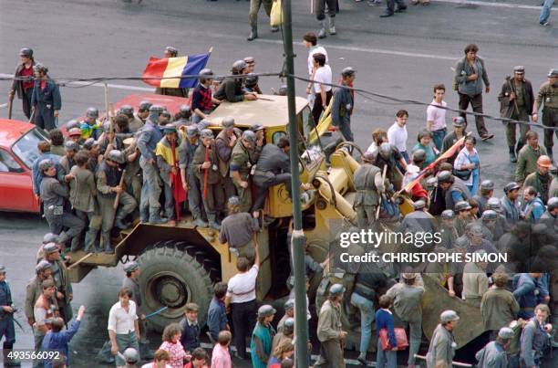 Miners prepare to fight against students demonstrators in downtown Bucharest on June 14, 1990. Romanian President Ion Ilescu appealed to the miners...