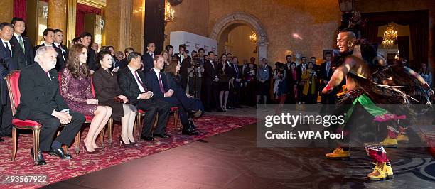 Catherine, Duchess of Cambridge , Chinese President Xi Jinping and his wife, Madame Peng Liyuan and Prince William, Duke of Cambridge watch a...