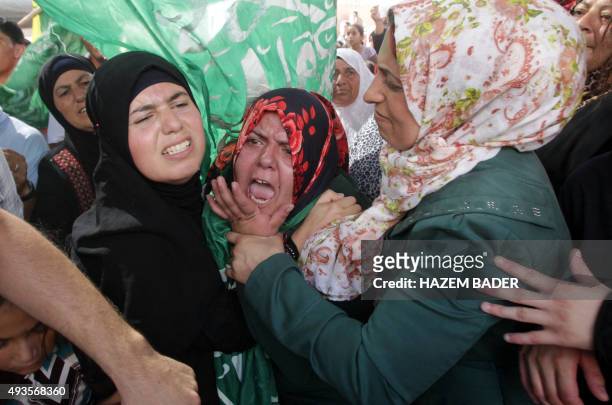 The aunt and one of the two wives of Udai al-Masalmeh, a Palestinian man who was shot dead after he carried out a stabbing attack on an Israeli...
