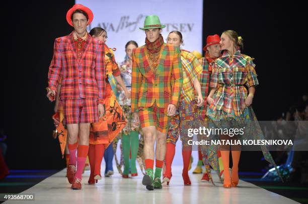 Models present creations by Russian designer Yegor Zaitsev during the Mercedes-Benz Fashion Week Russia in Moscow on October 21, 2015. AFP PHOTO /...