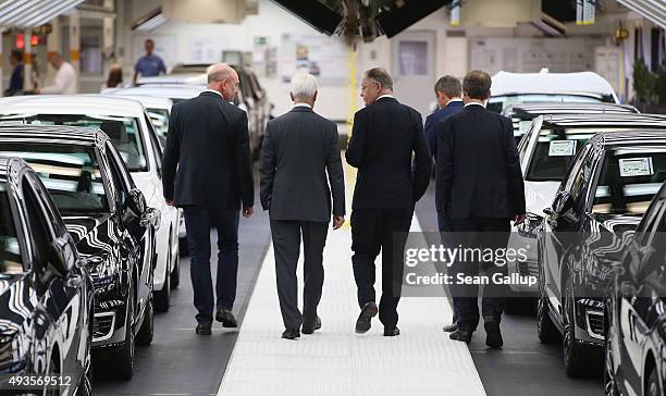 New Volkswagen Group Chairman Matthias Mueller , Volkswagen Work Council head Bernd Osterloh and Lower Saxony Governor Stephan Weil depart after...