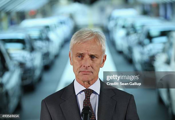 New Volkswagen Group Chairman Matthias Mueller speaks to the media with Volkswagen Work Council head Bernd Osterloh and Lower Saxony Governor Stephan...