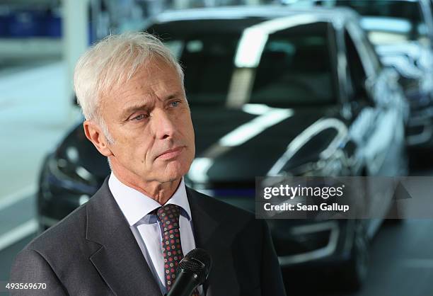 New Volkswagen Group Chairman Matthias Mueller speaks to the media with Volkswagen Work Council head Bernd Osterloh and Lower Saxony Governor Stephan...