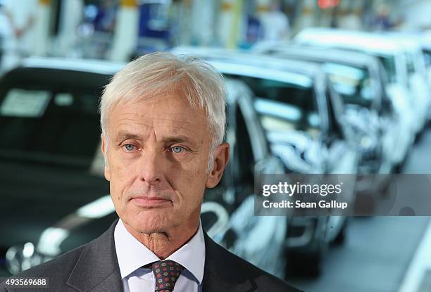 New Volkswagen Group Chairman Matthias Mueller speaks to the media with Volkswagen Work Council head Bernd Osterloh and Lower Saxony Governor Stephan...