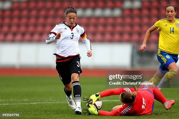 Matilda Haglund of Sweden saves the ball against Felicitas Rauch of Germany during the Women's International Friendly match between U20 Germany and...