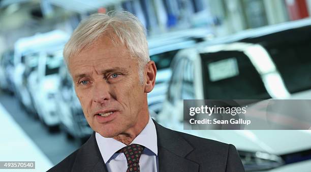 New Volkswagen Group Chairman Matthias Mueller speaks to the media with Volkswagen Work Council head Bernd Osterloh and Lower Saxony Governor Stephan...