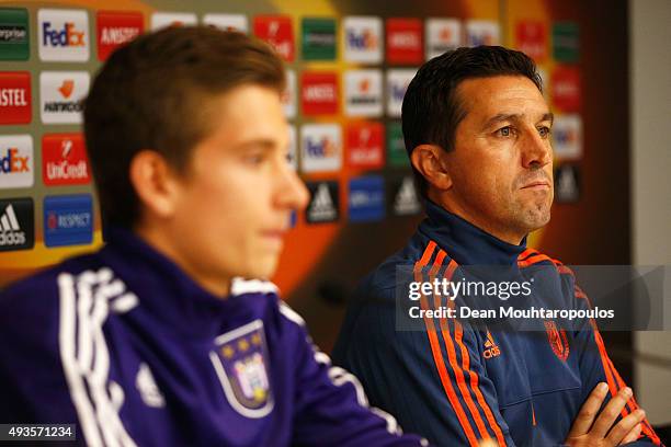 Dennis Praet of Anderlecht and Manager / Head Coach, Besnik Hasi speak to the media during a RSC Anderlecht training press conference ahead of the...