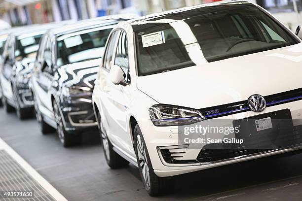 Finished Volkswagen cars arrive at the end of the assembly line prior to a visit by Volkswagen Group Chairman Matthias Mueller and Lower Saxony...