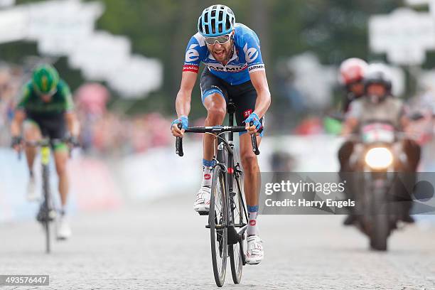 Ryder Hesjedal of Canada and team Garmin-Sharp crosses the finish line during the fourteenth stage of the 2014 Giro d'Italia, a 164km high mountain...