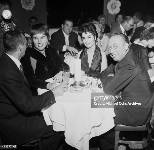 Actress Deanna Durbin her husband Charles David with Dorothy and Joseph Pasternak at dinner at Mocambo's in Los Angeles, California.