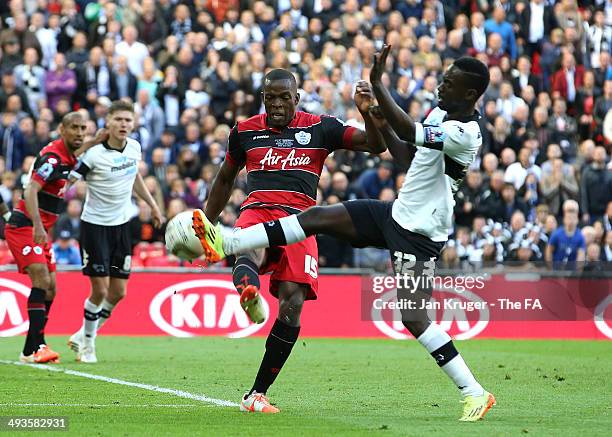 Nedum Onuoha of Queens Park Rangers battles with Simon Dawkins of Derby County during the Sky Bet Championship playoff final match between Derby...