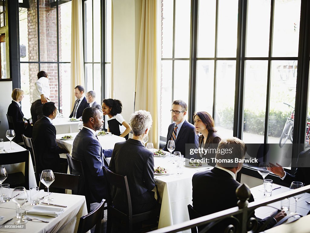 Business people having lunch in restaurant
