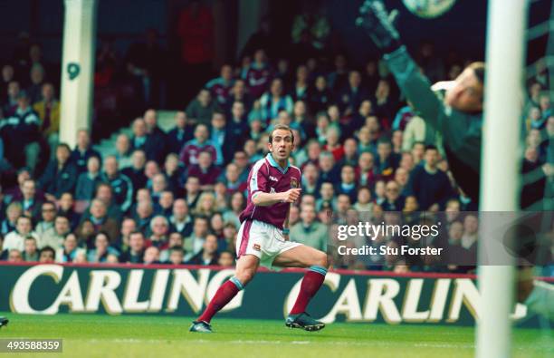 West Ham United player Paolo Di Canio fires in the first goal past Neil Sullivan during the FA Carling Premiership match between West Ham United and...