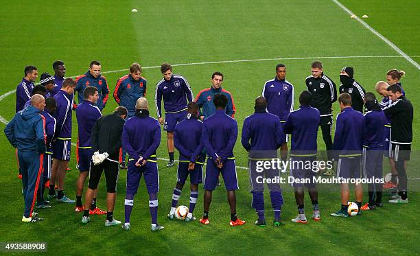 Besnik Hasi, head coach of Anderlecht speaks to his players during a RSC Anderlecht training session ahead of the UEFA Europa League match against...