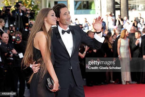 Adrien Brody and his girlfriend Lara Leito attend the Closing Ceremony and "A Fistful of Dollars" screening during the 67th Annual Cannes Film...